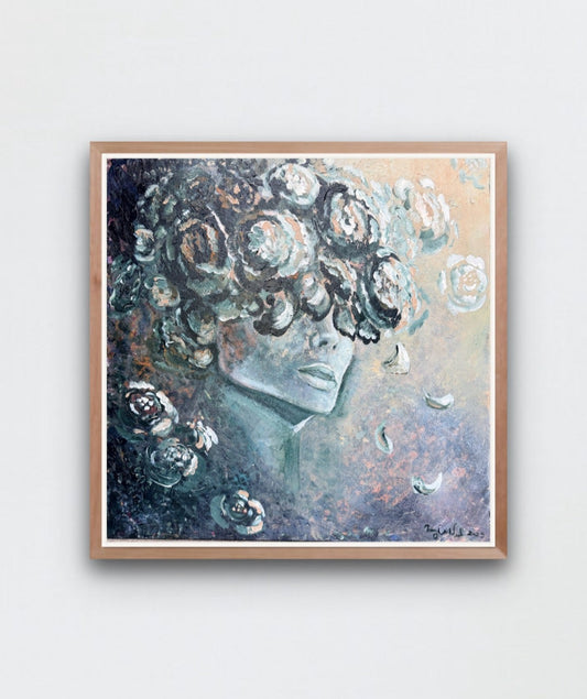 a modern female painting surrounded in florals in blues and neutral tones hangs on a white wall
