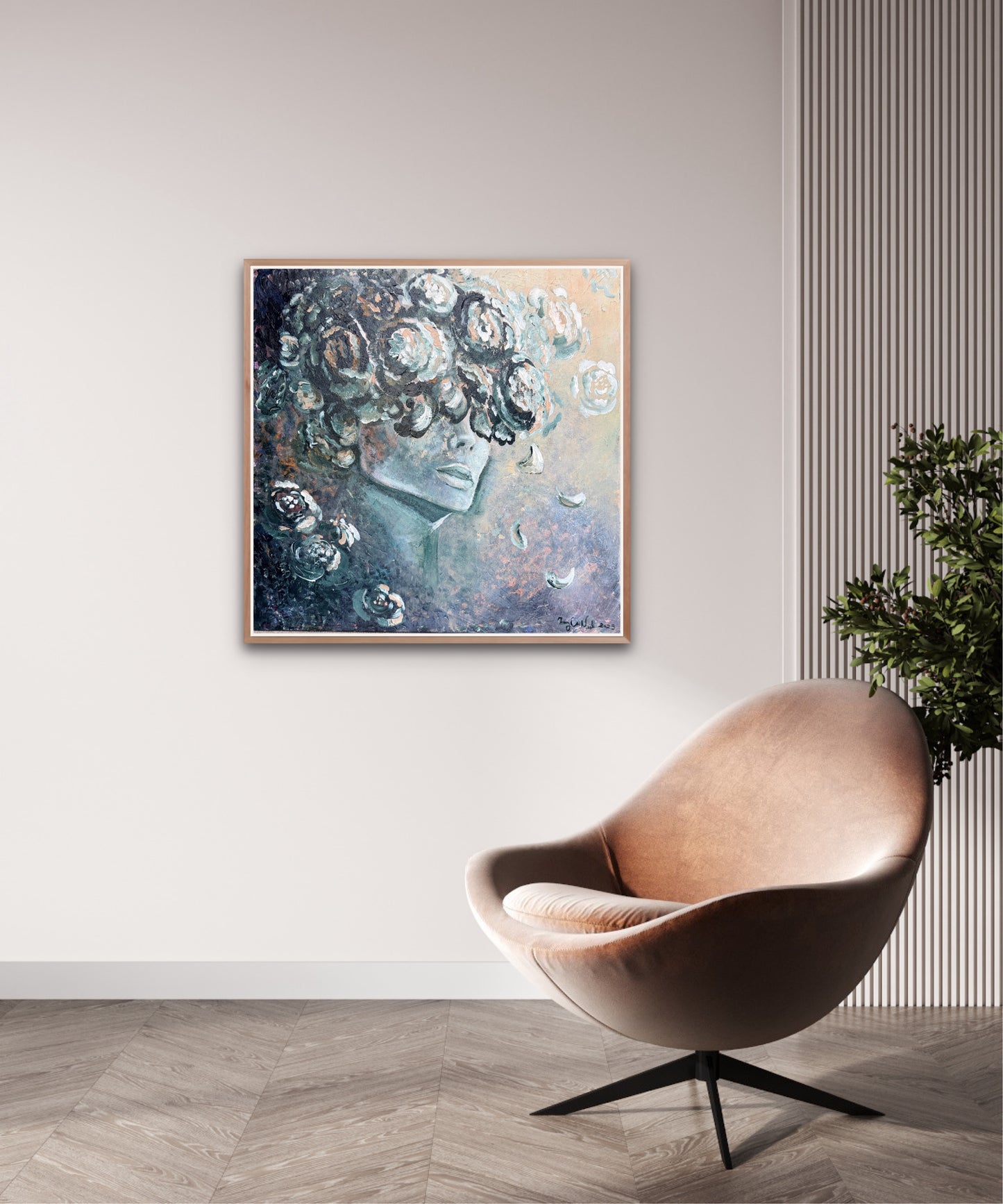 Modern interior with a beige chair, abstract painting, and plant on a light gray wall.