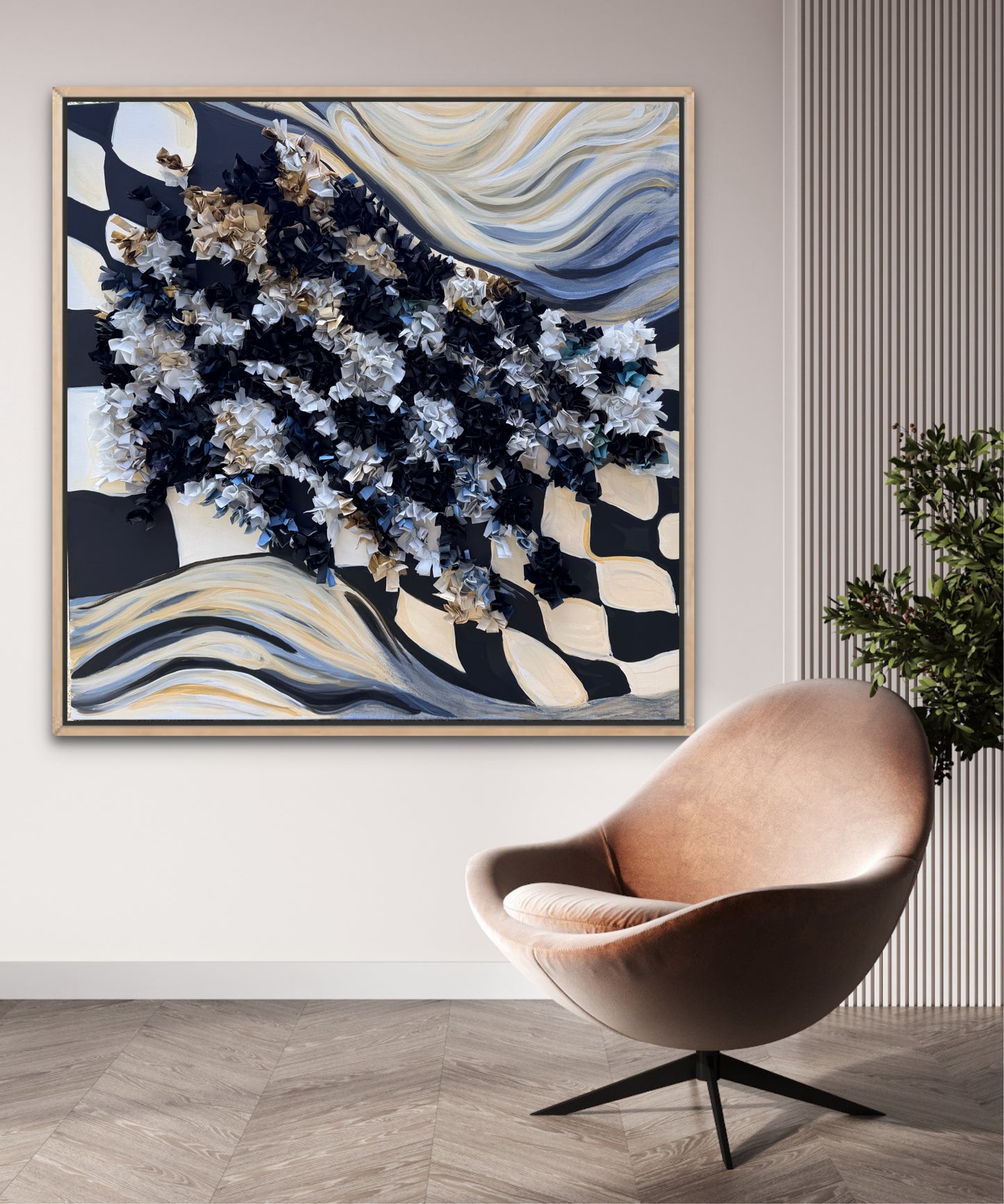 abstract black and white checkered flag art hangs on wall with modern brown chair and plant below