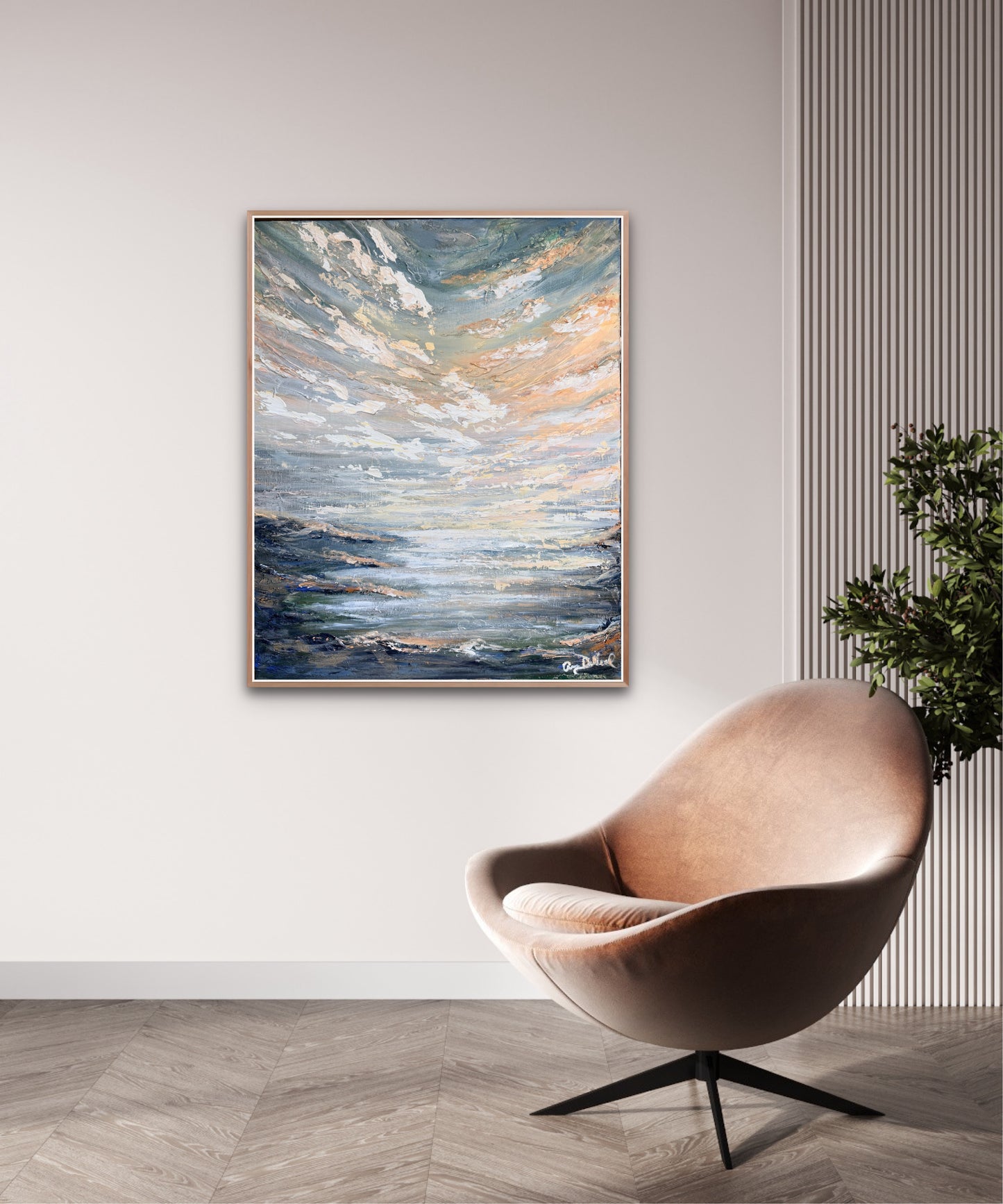 serene beach painting hangs on wall above a modern brown chair and plant