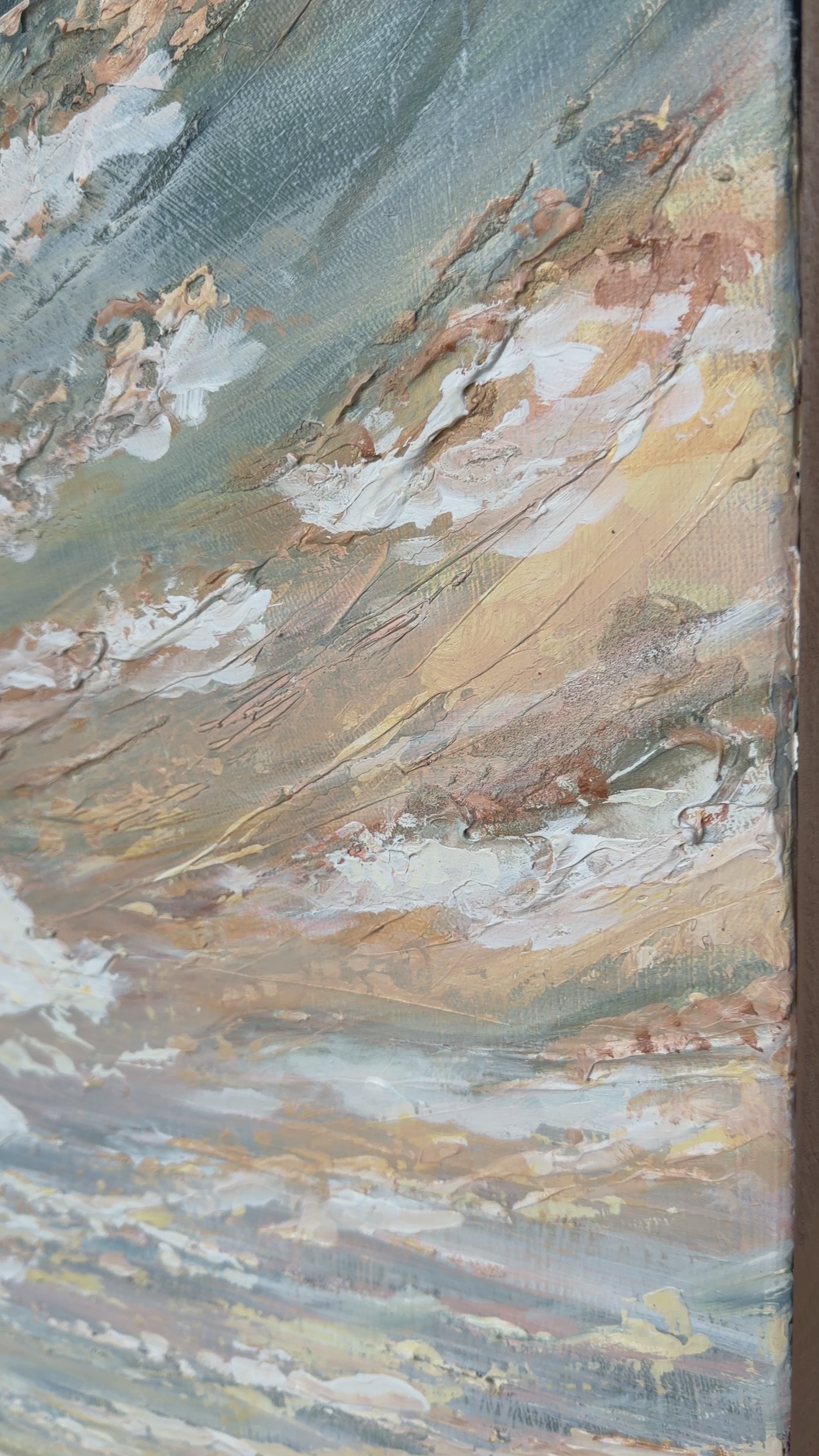 video of a close up of a muted tone textured beach painting
