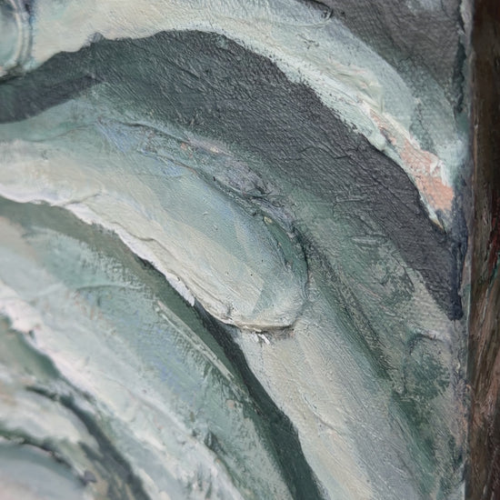 a close up of the details of the bloom painting, shows texture and navy, green, white painting