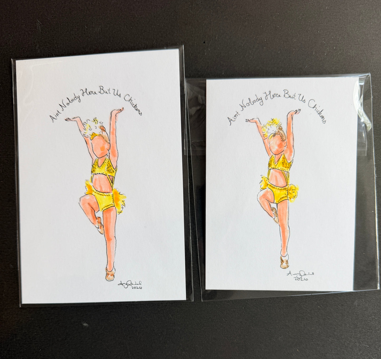 Two sizes of a marker sketch of a dancer in a yellow dance costume and headpiece with the words Aint Nobody Here But Us Chickens above