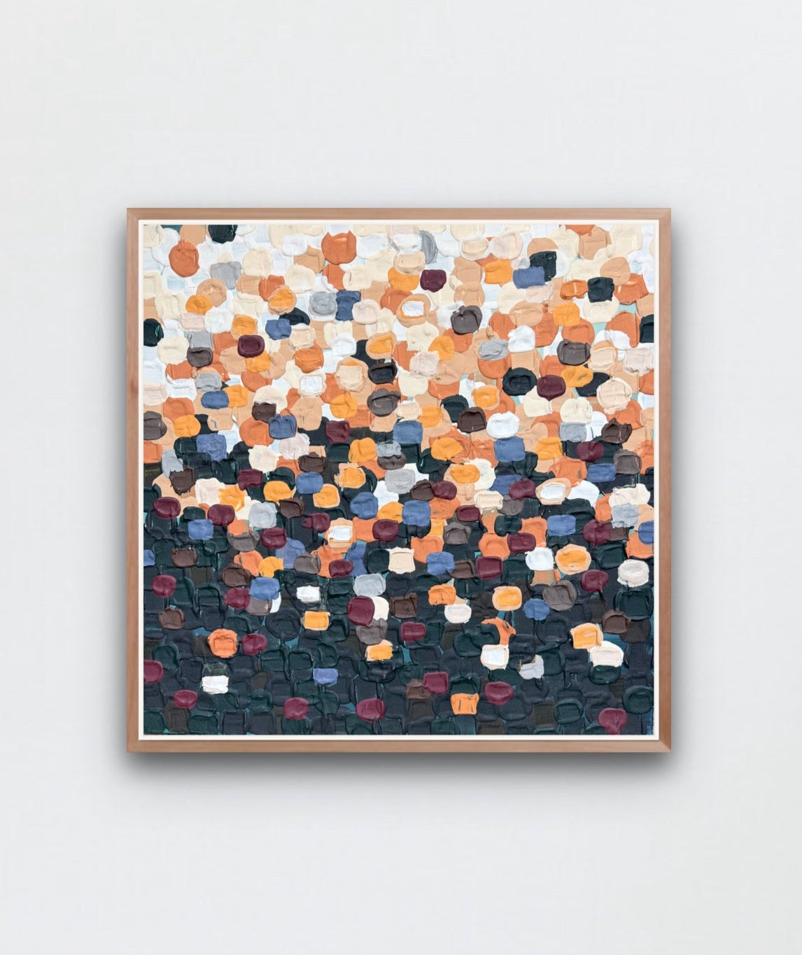 colorful abstract art framed on a white wall