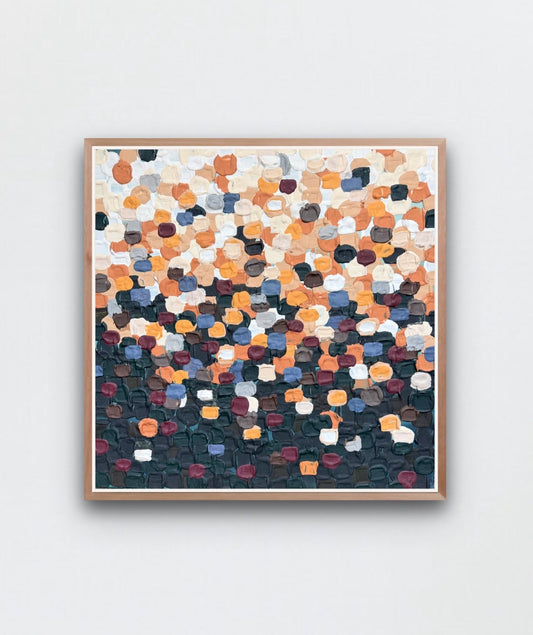 colorful abstract art framed on a white wall