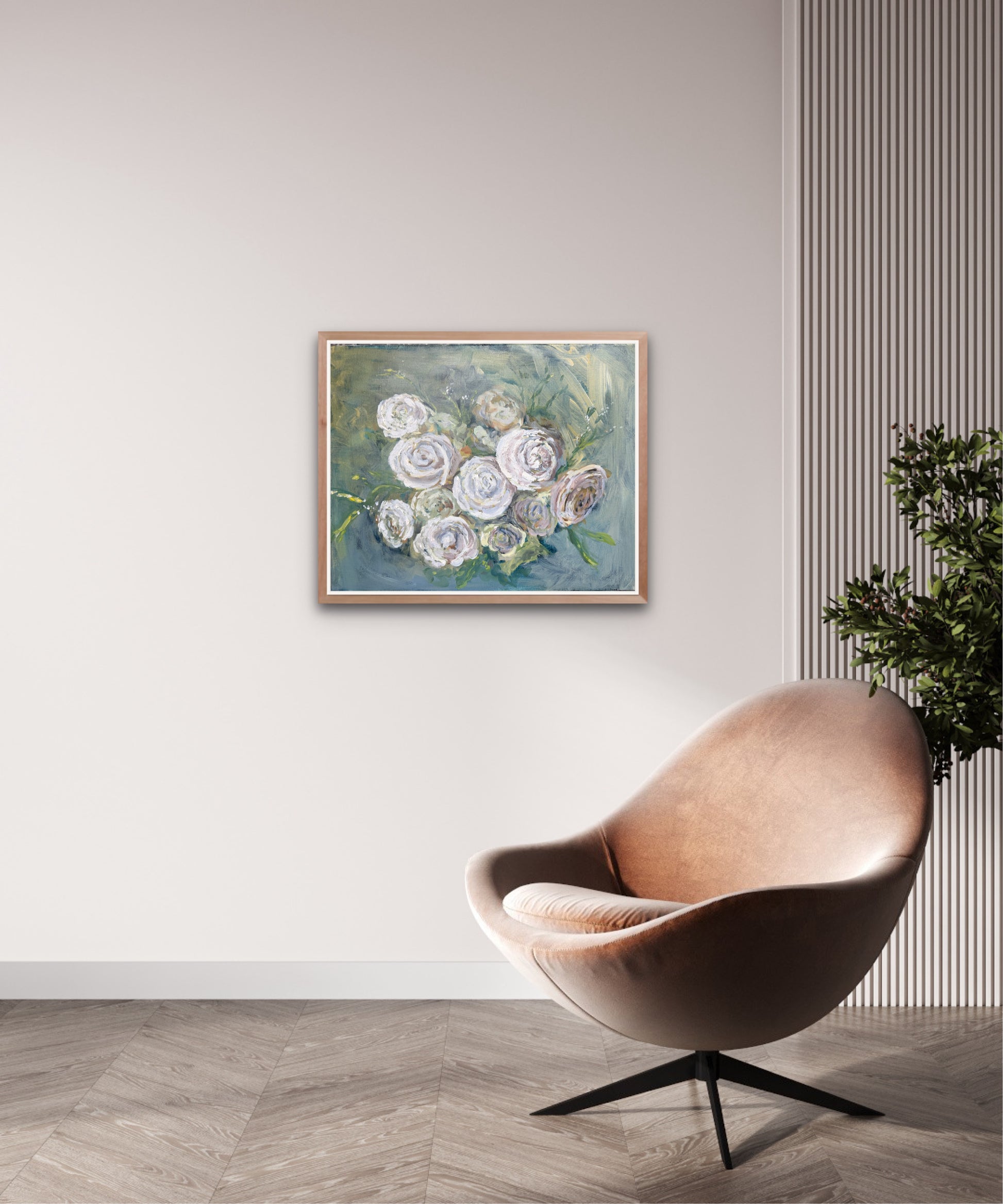 a painting of white roses on a blue green background hangs on a white wall with a modern leather chair and a plant below